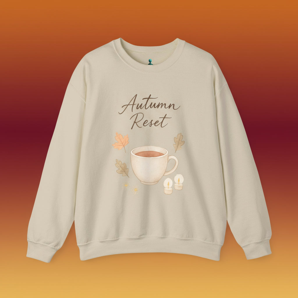 Beige sweatshirt with 'Autumn Reset' text and coffee cup graphic on a white background