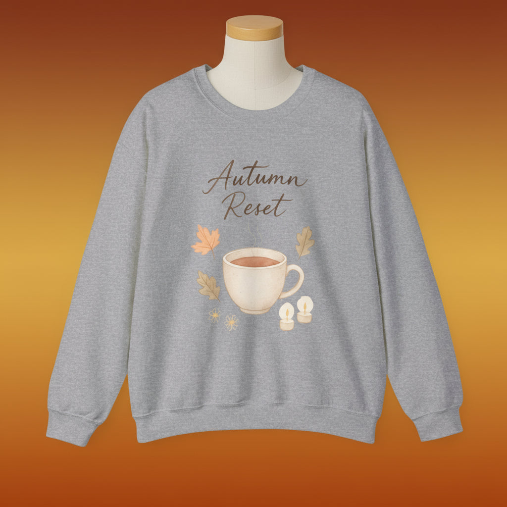 Gray sweatshirt with 'Autumn Reset' text and coffee cup graphic on a white background