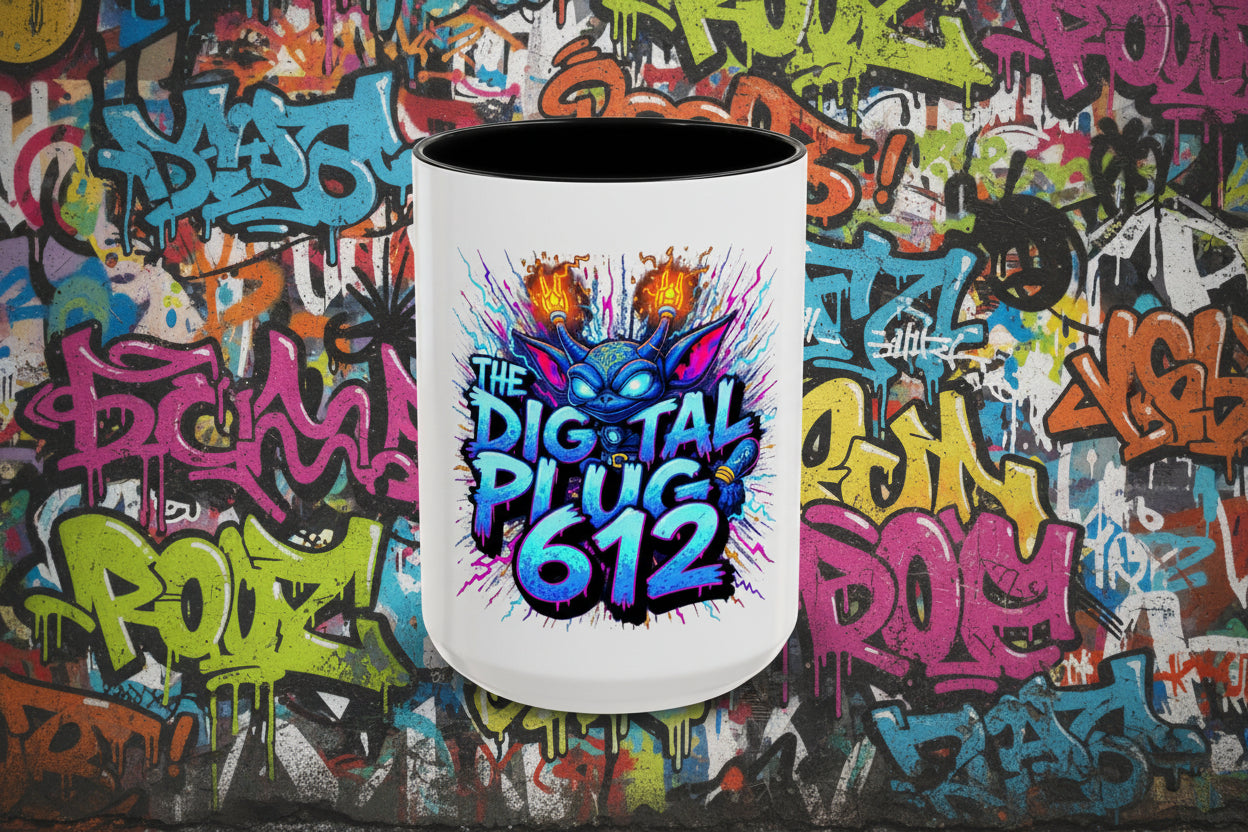 White mug with colorful graphic and text 'The Digital Plug 612' on a white background