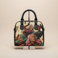 Handbag with artistic design of stylized faces on a white background