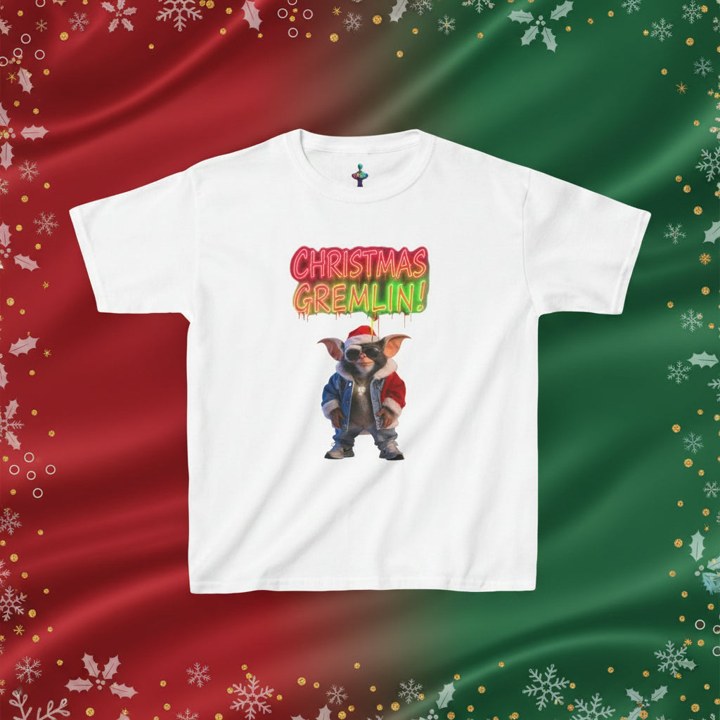 White t-shirt with a Christmas-themed graphic of a gremlin and colorful text on a white background
